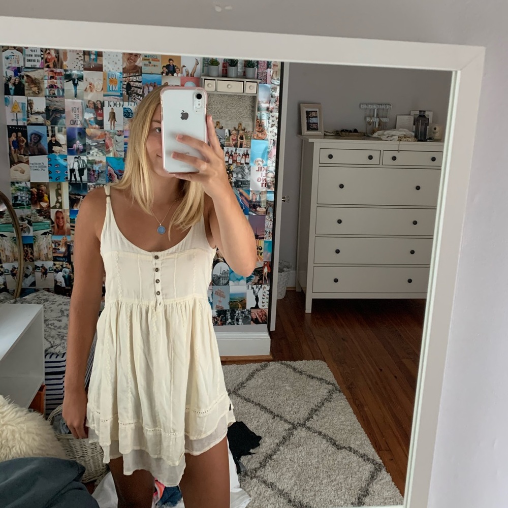 Cream dress with button detail